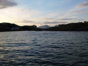 Sunset Port Mor, Muck.  Rum mountains in background.